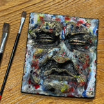 Handsculpted face wall art